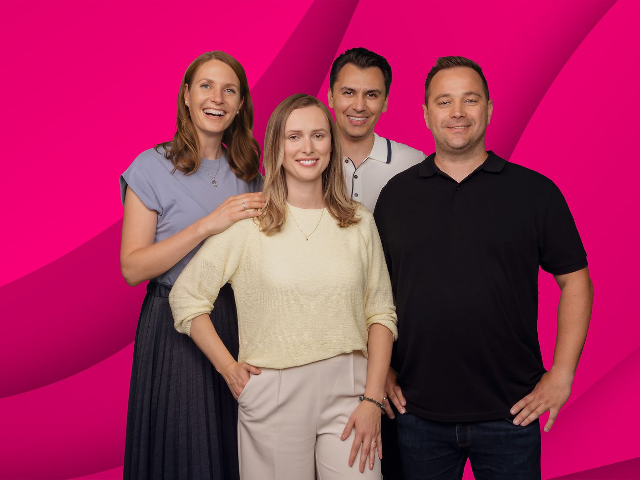 Several people smiling at the camera