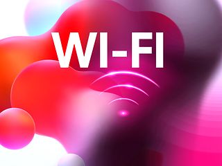 Das Wort Wi-Fi und das Funksymbol vor buntem Hintergrund