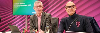 Von links: Christian Illek und Tim Höttges auf der Pressekonferenz.