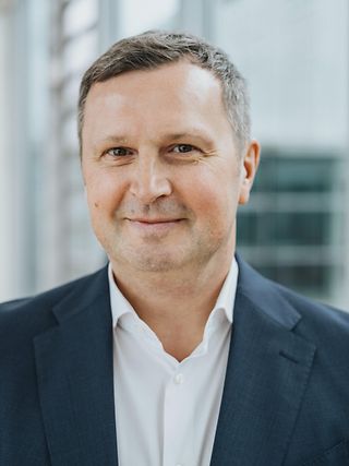 Portraitfoto von Klaus Werner, Geschäftsführer Geschäftskunden, Telekom Deutschland.