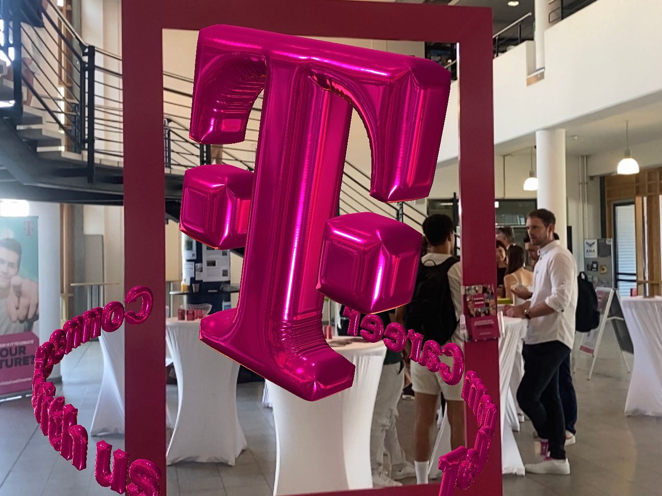 A floating magenta T