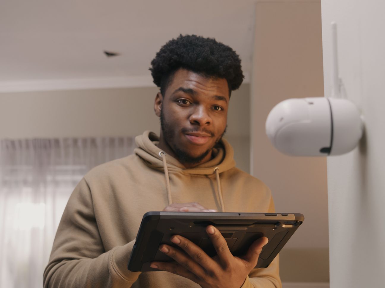 A man working on a tablet computer.