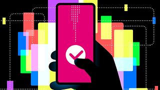 The picture is colorful. In the center is a hand holding a cell phone. The thumb clicks on the magenta-colored display.