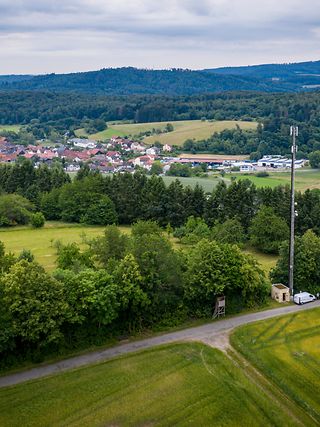 Landschaft mit Mobilfunkmast