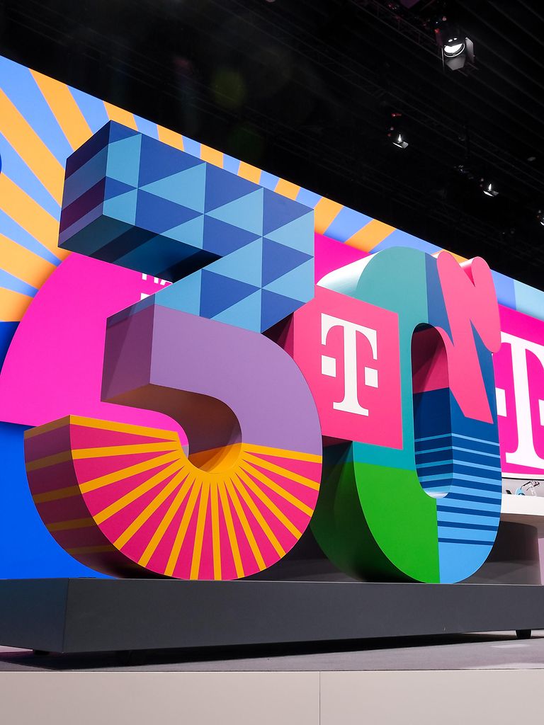 A large, colorful “30”, set up on a stage.