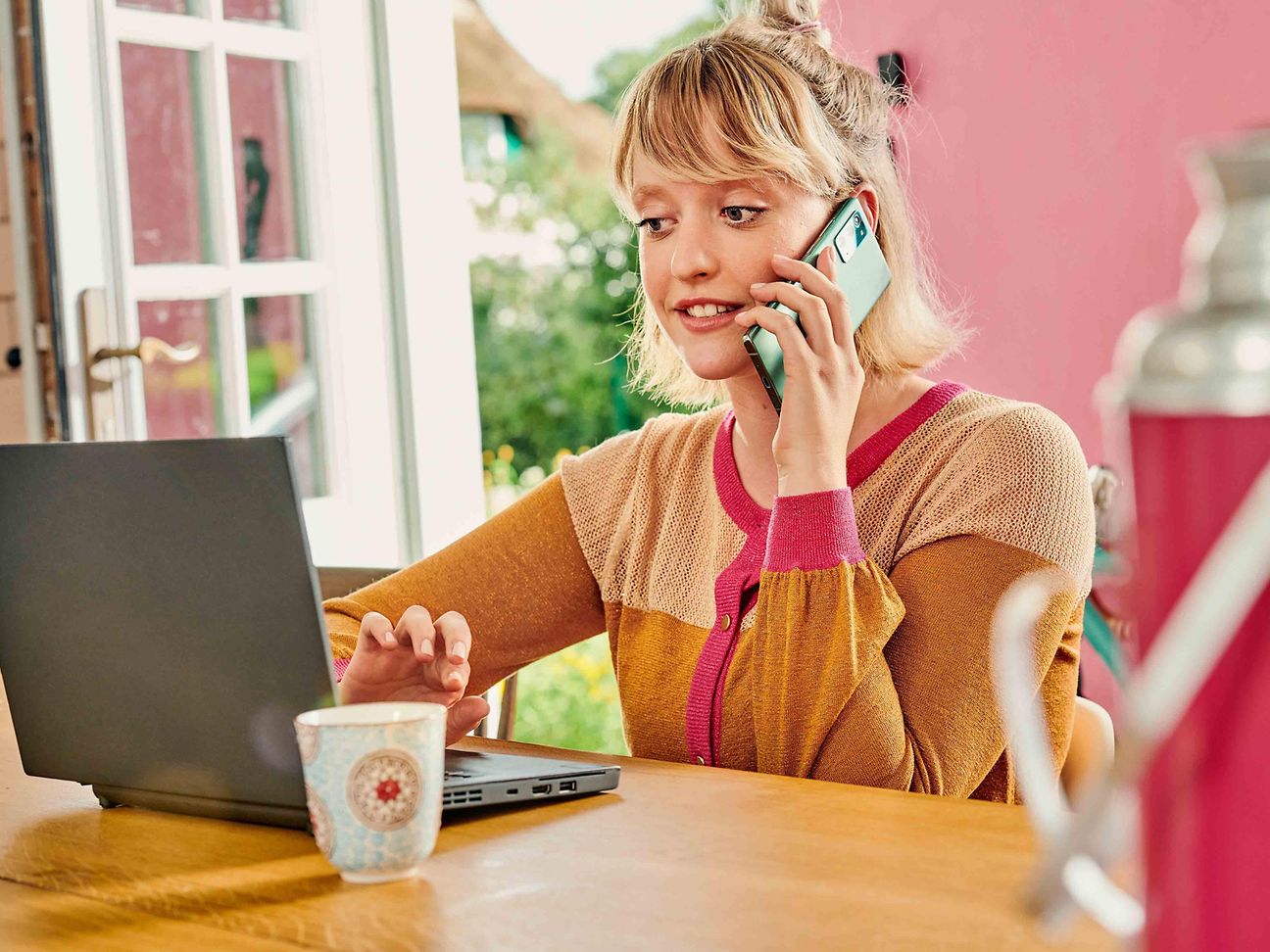 Woman sitting in front of the computer in video interviews