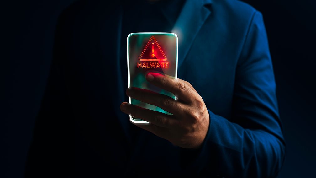 Smartphone showing a malware warning