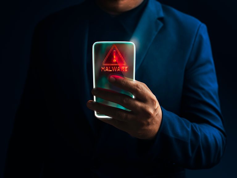 Smartphone showing a malware warning