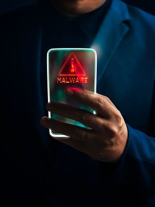 Smartphone showing a malware warning